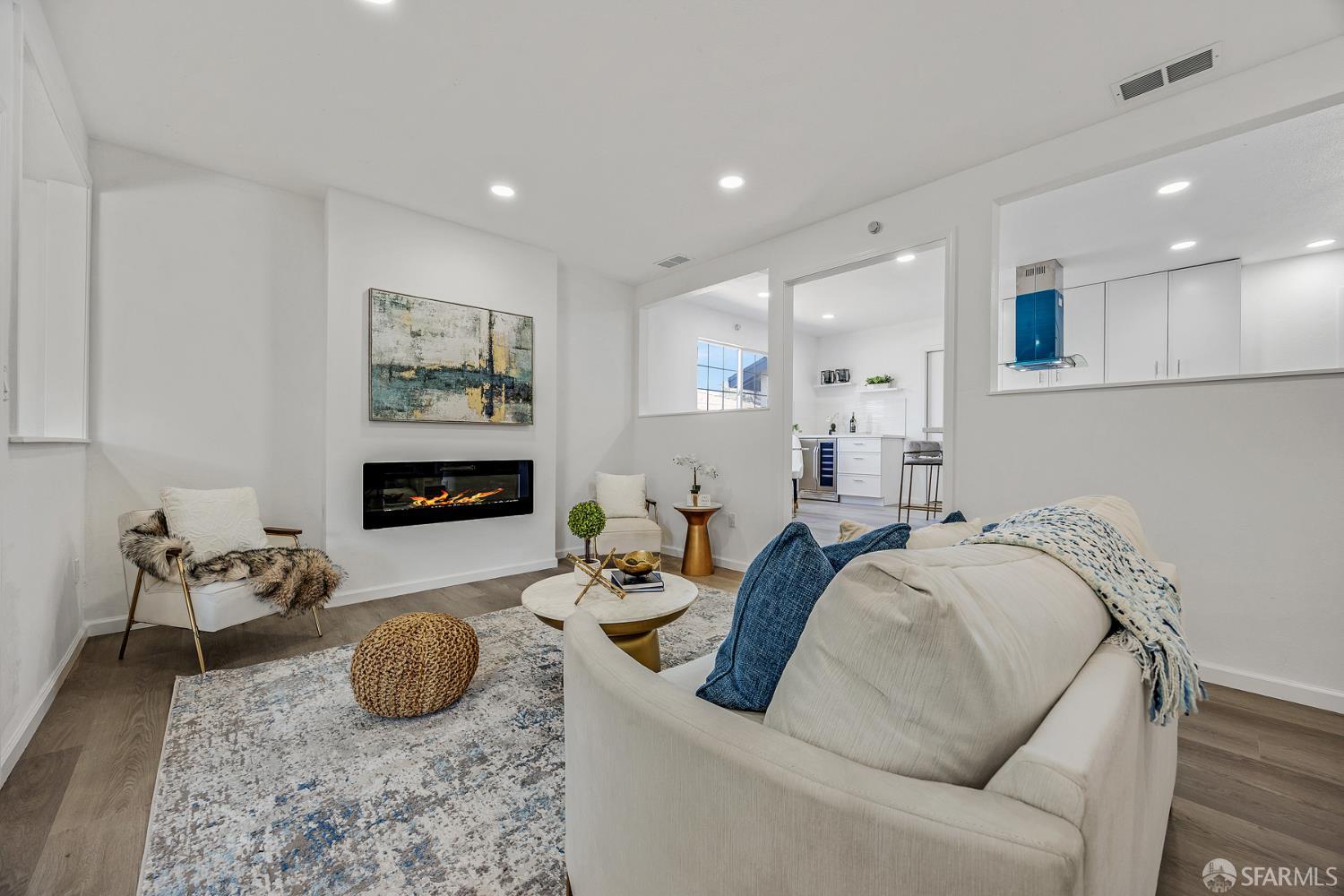 3138 Flannery Road San Pablo, CA 94806 - Photo 5 of 38 a living room with furniture and a fireplace