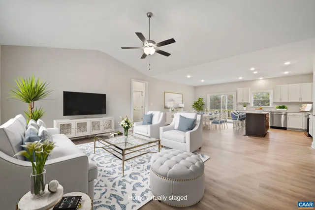a view of a kitchen with a dishwasher cabinets and wooden floor