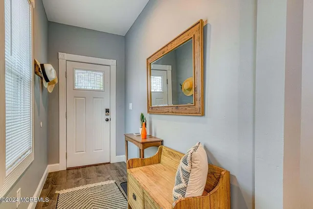 a view of a bedroom from a corridor