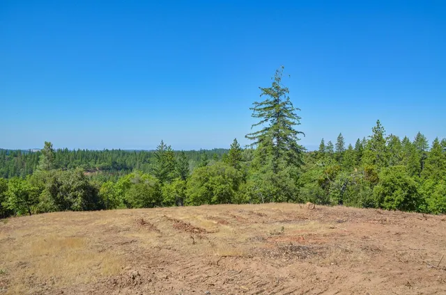 a picture of a glass door with a white house