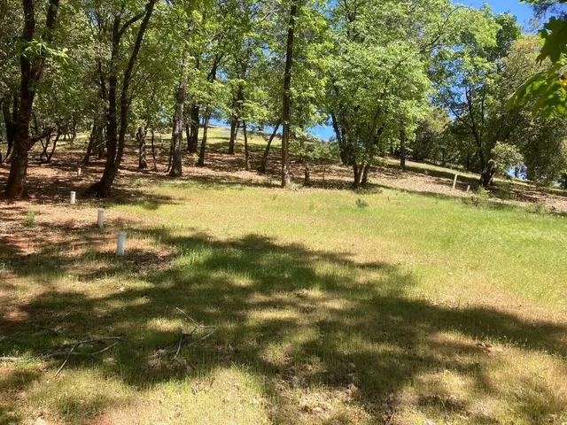 a view of a large body of water with a building in the background