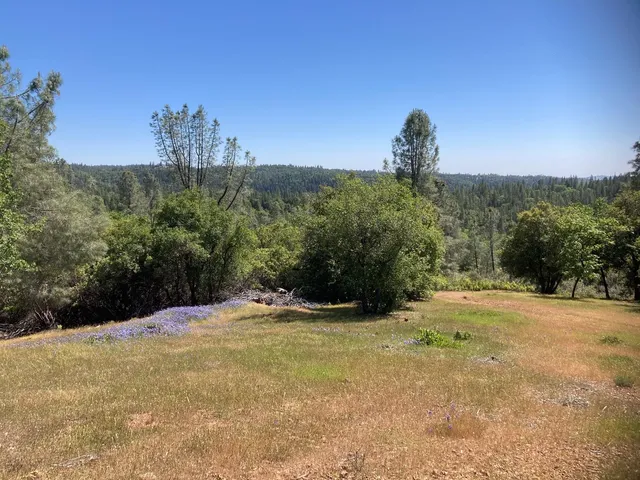 a view of outdoor space with mountain view