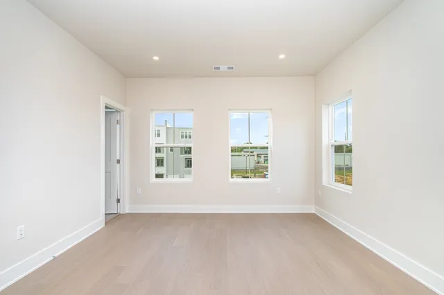 an empty room with windows