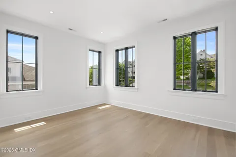 an empty room with windows