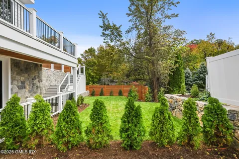 a view of a garden in front of house