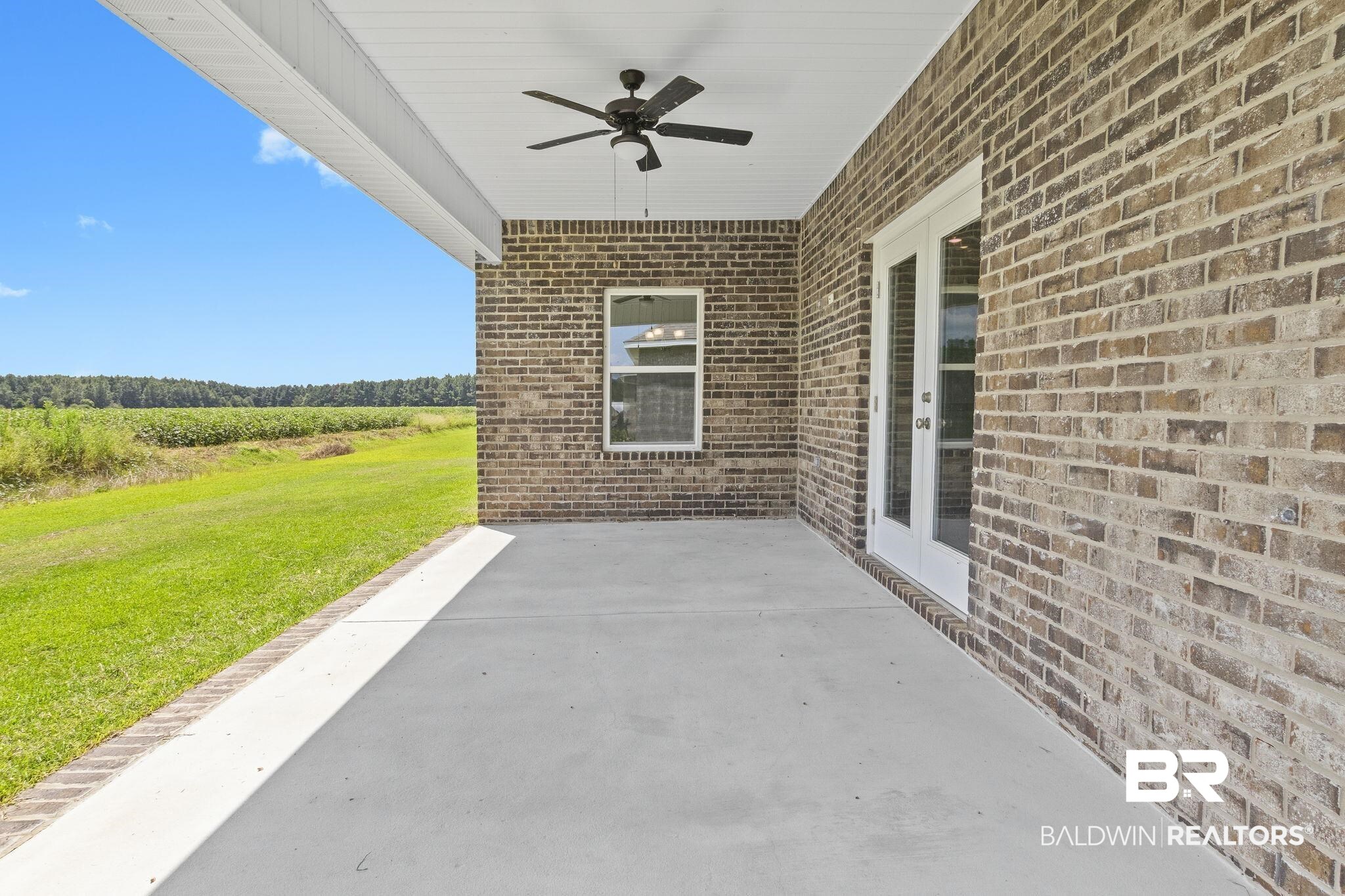 11303 Genuine Risk Circle Daphne, AL 36526 - Photo 73 of 100 View of patio / terrace featuring ceiling fan