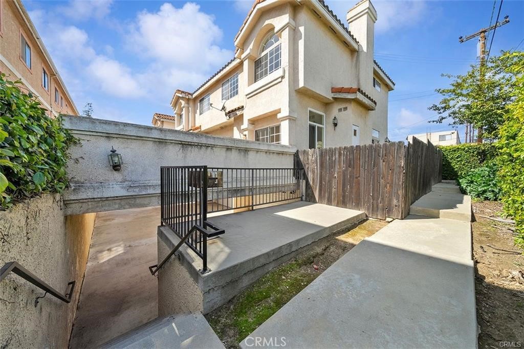 134 North Atlantic Boulevard, Unit B Alhambra, CA 91801 - Photo 14 of 18 a view of a patio with a table and chairs