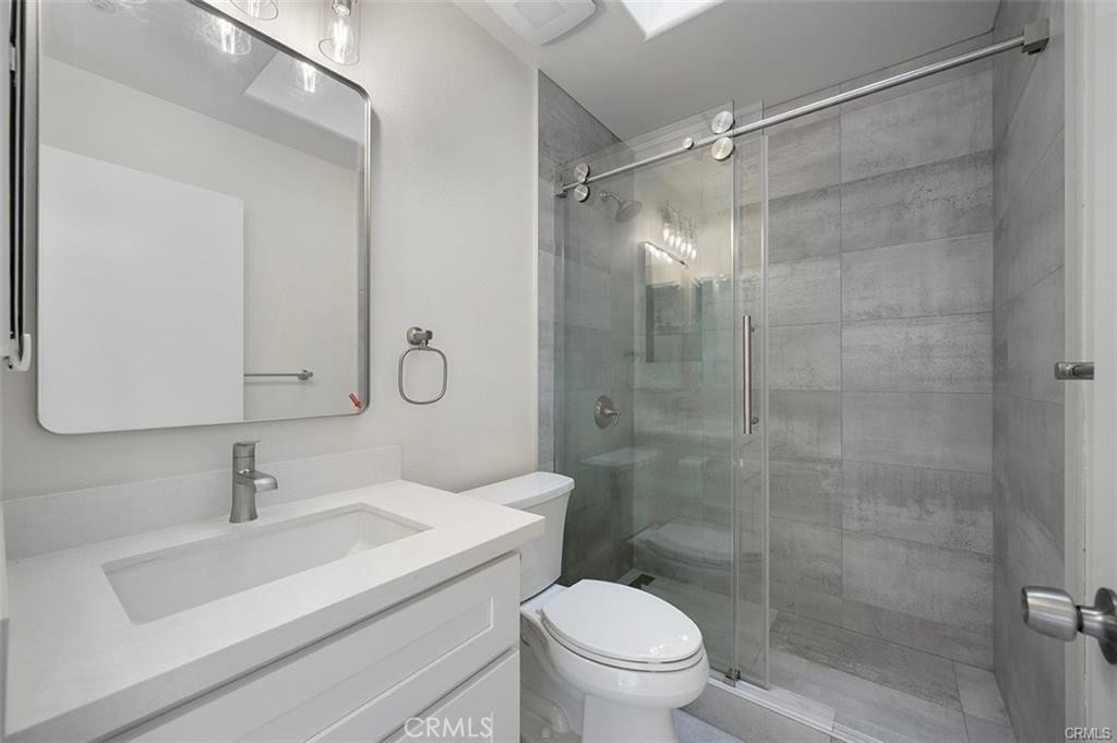 134 North Atlantic Boulevard, Unit B Alhambra, CA 91801 - Photo 10 of 18 a bathroom with a sink toilet and shower
