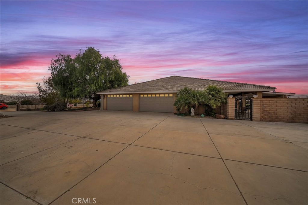 7172 Jargon Road Hesperia, CA 92344 - Photo 4 of 75 a view of a road with a building in the background