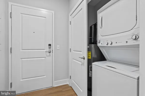 a view of bathroom with a washer and dryer