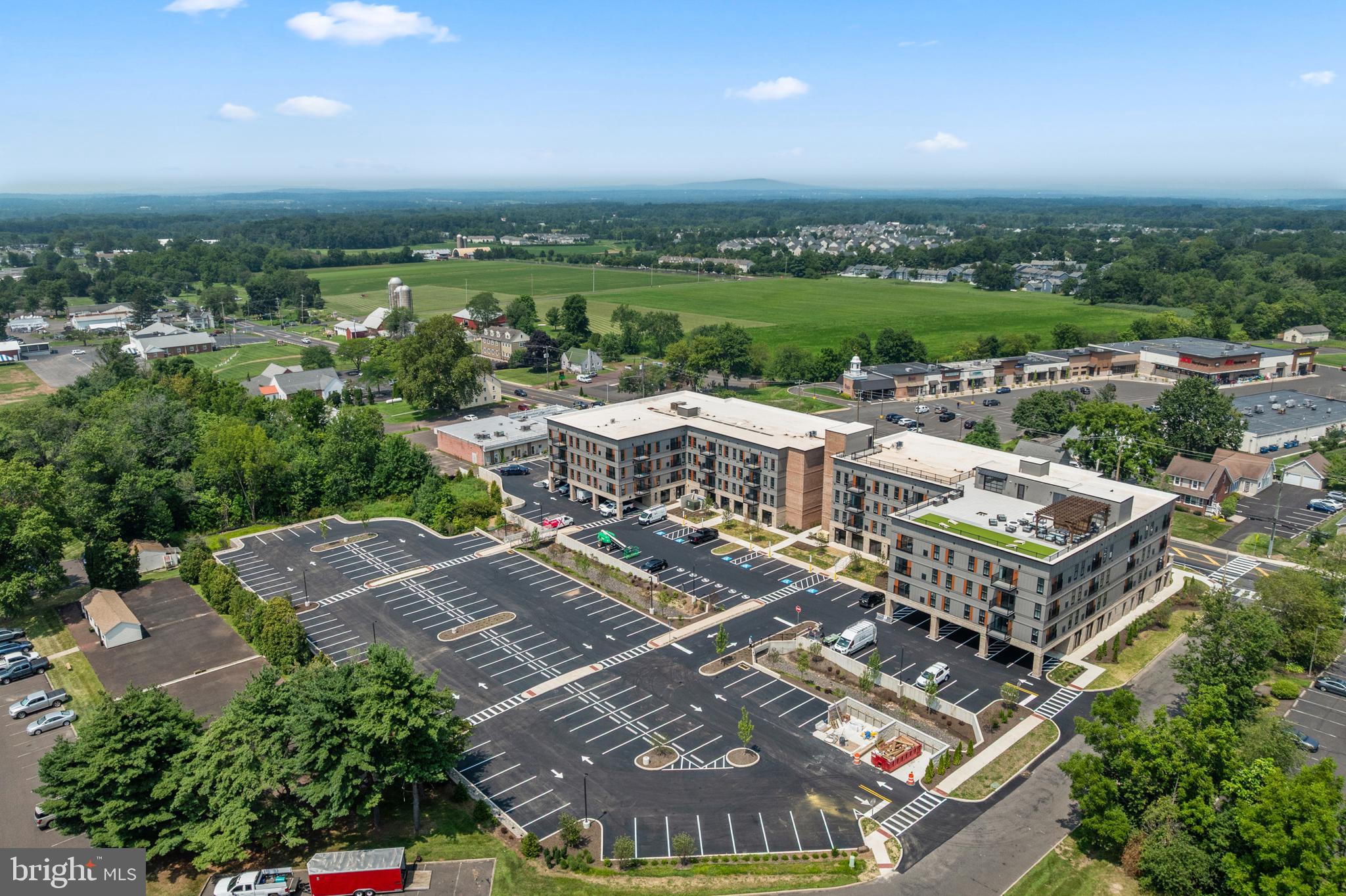 144 North Main Street Dublin, PA 18917 - Photo 17 of 40 an aerial view of a house with a big yard