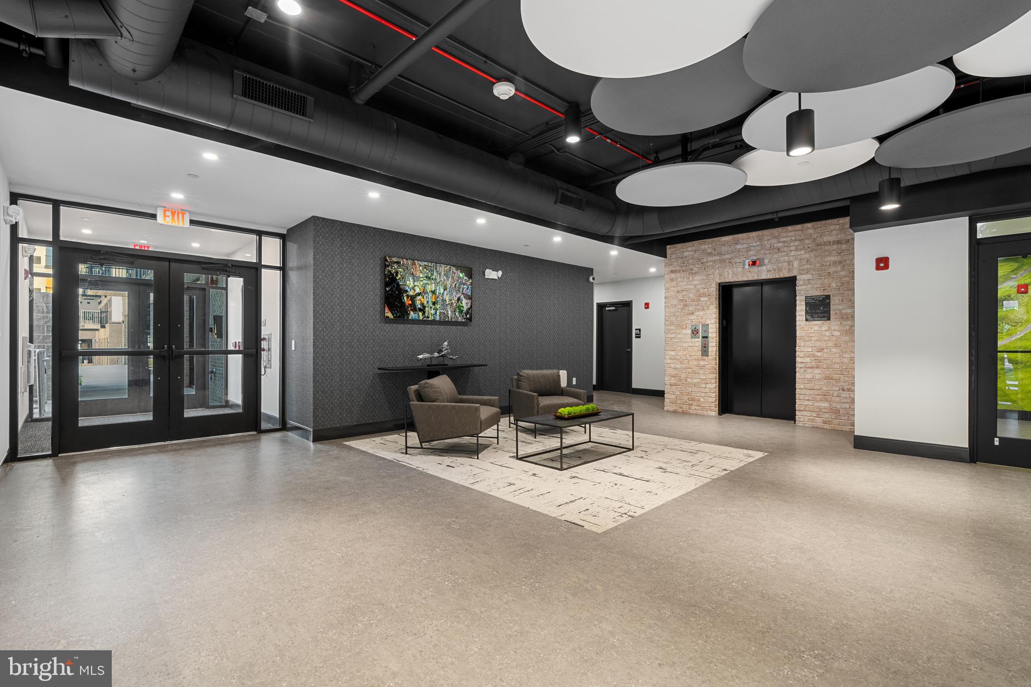 144 North Main Street Dublin, PA 18917 - Photo 23 of 40 a view of a hall with dining room and wooden furniture