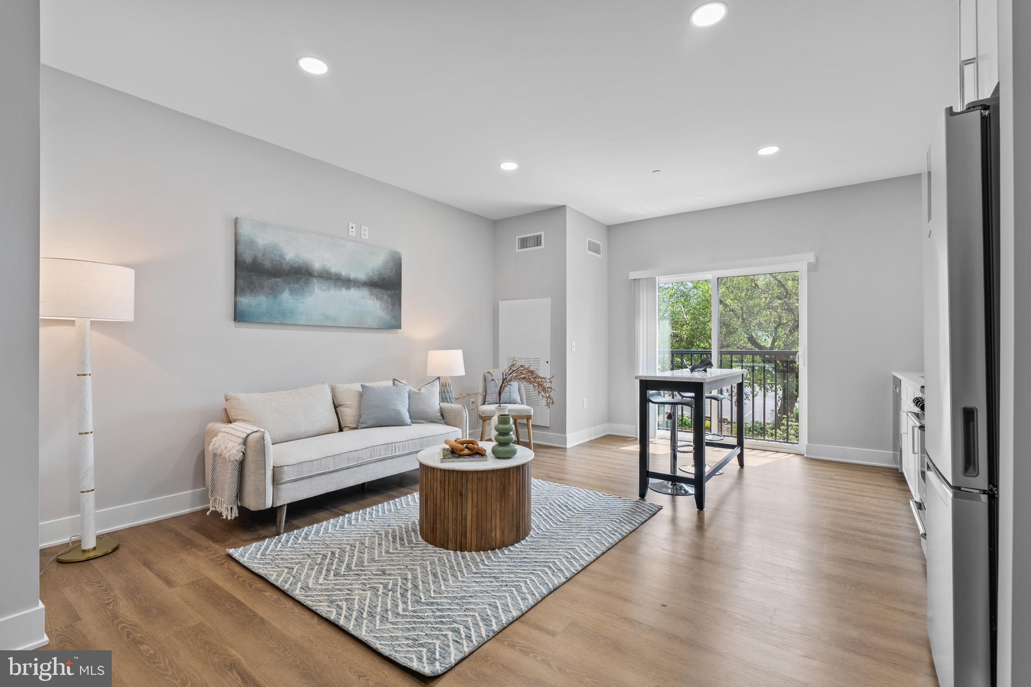 144 North Main Street Dublin, PA 18917 - Photo 3 of 40 a living room with furniture rug and a window