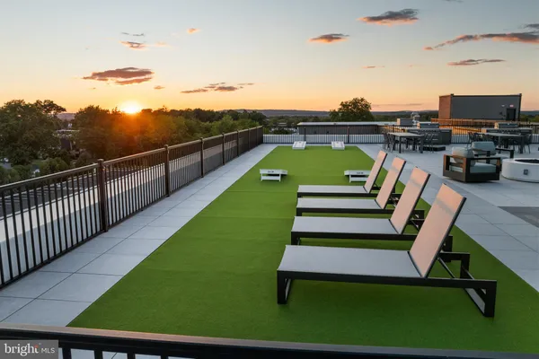 a view of a chairs in the roof deck