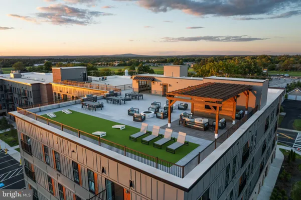 a view of a terrace with sitting area