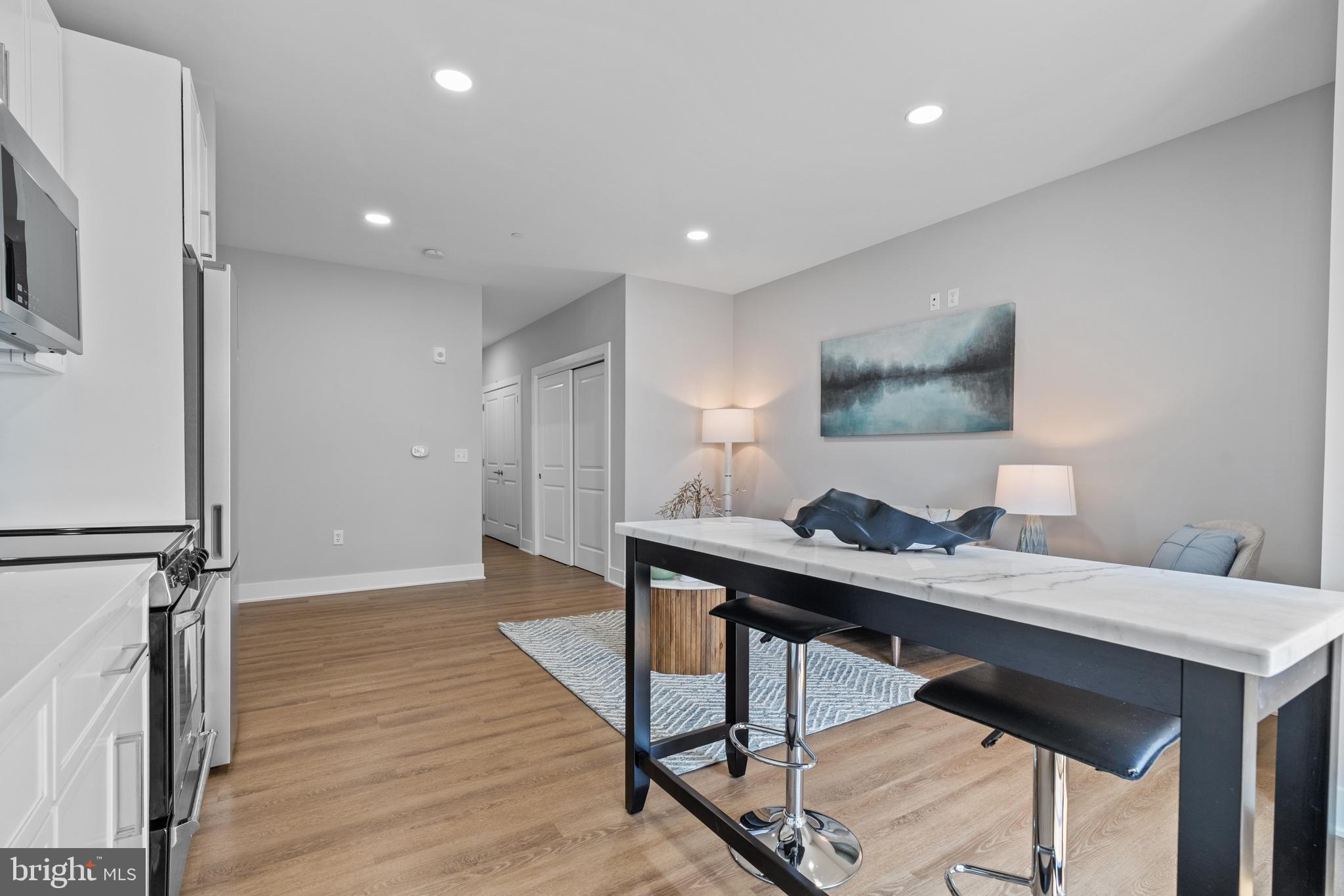 144 North Main Street Dublin, PA 18917 - Photo 10 of 40 a view of a workspace with furniture and wooden floor