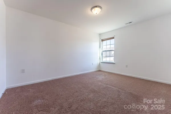 an empty room with an entryway