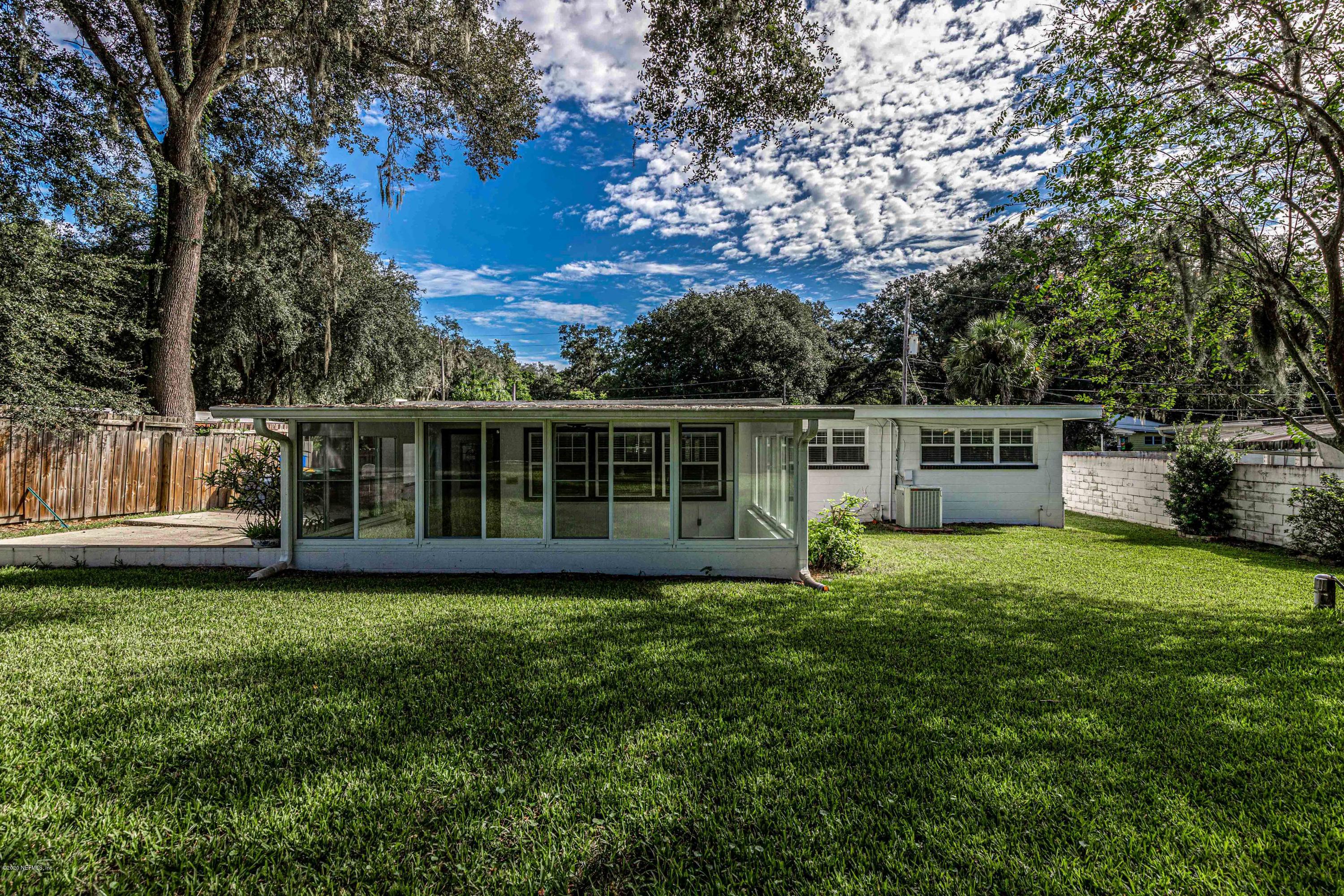 3118 Kline Road Jacksonville, FL 32246 - Photo 32 of 39 a view of an house with backyard space and balcony