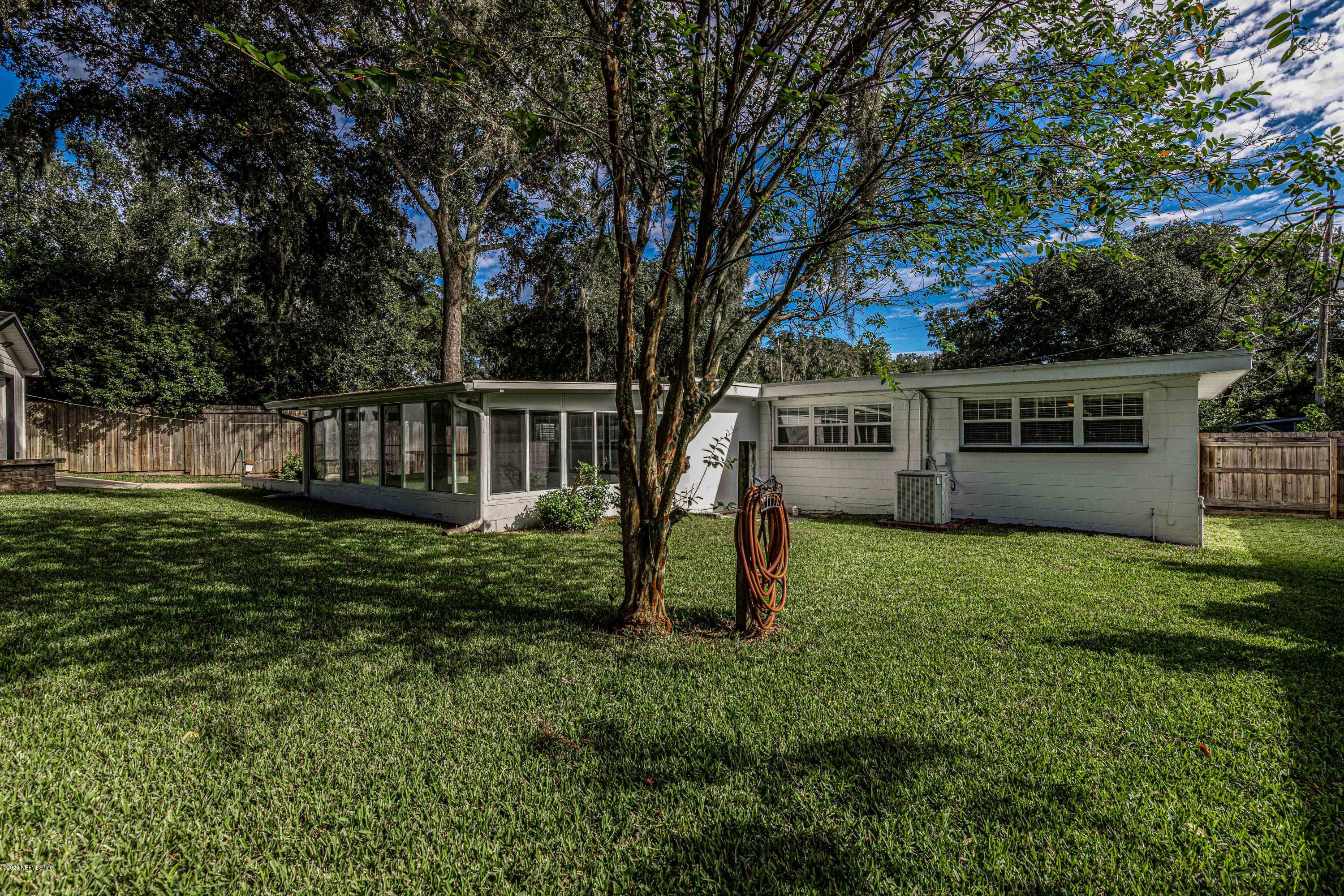 3118 Kline Road Jacksonville, FL 32246 - Photo 33 of 39 a view of a house with backyard and sitting area