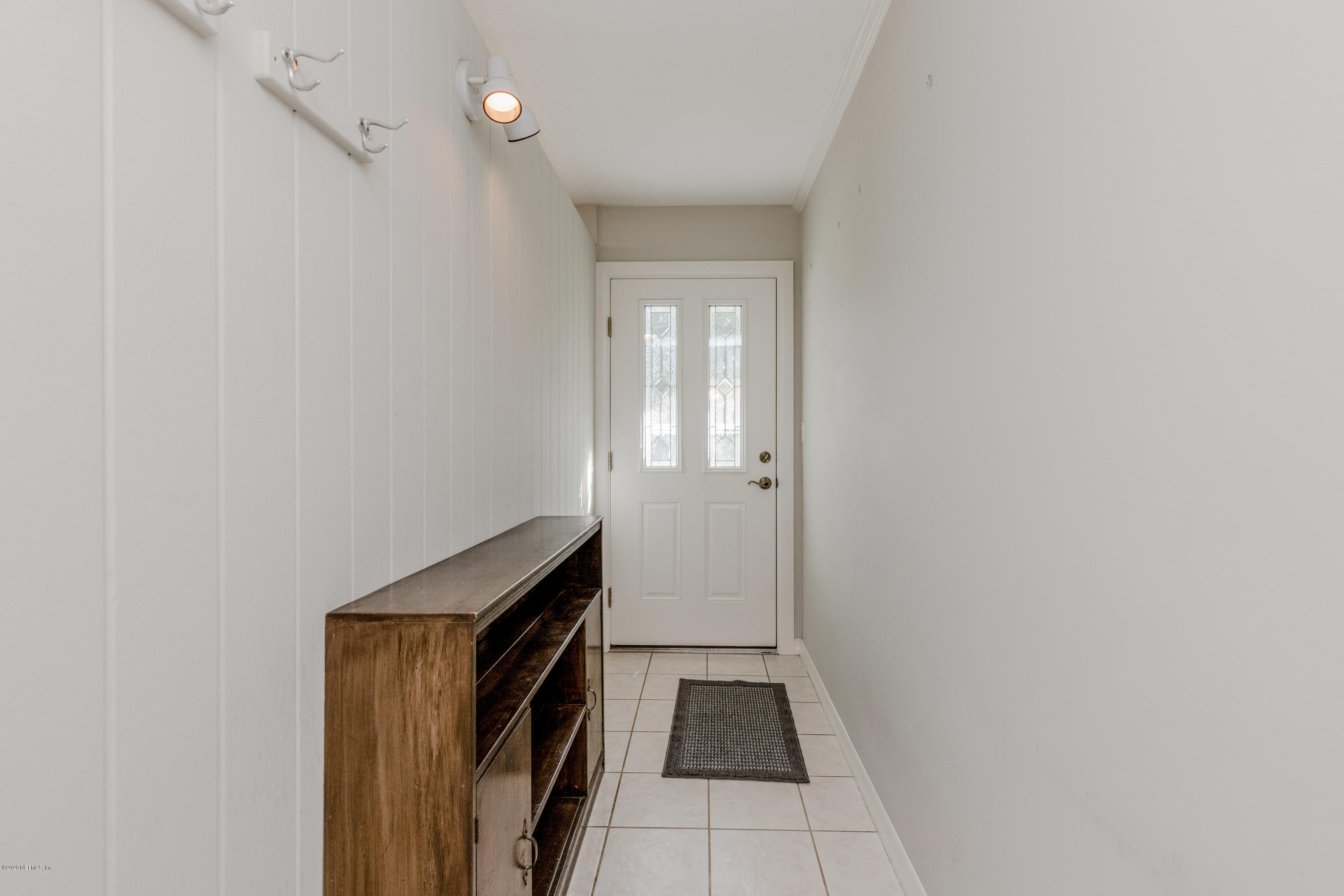 3118 Kline Road Jacksonville, FL 32246 - Photo 5 of 39 a view of a bathroom from a hallway