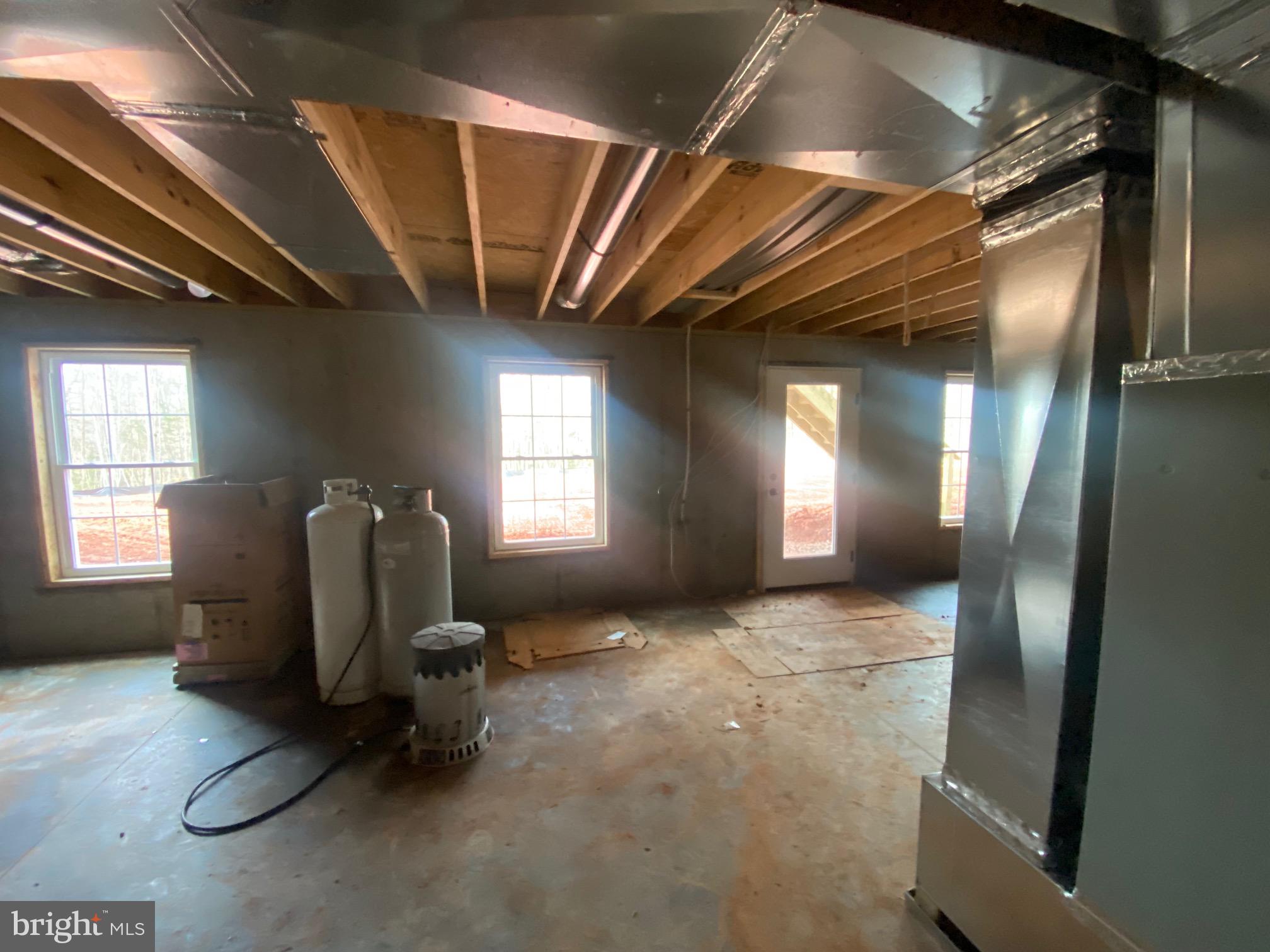 12260 Tower Road Unionville, VA 22567 - Photo 9 of 12 full unfin. basement w/ 4 windows & bath rough in