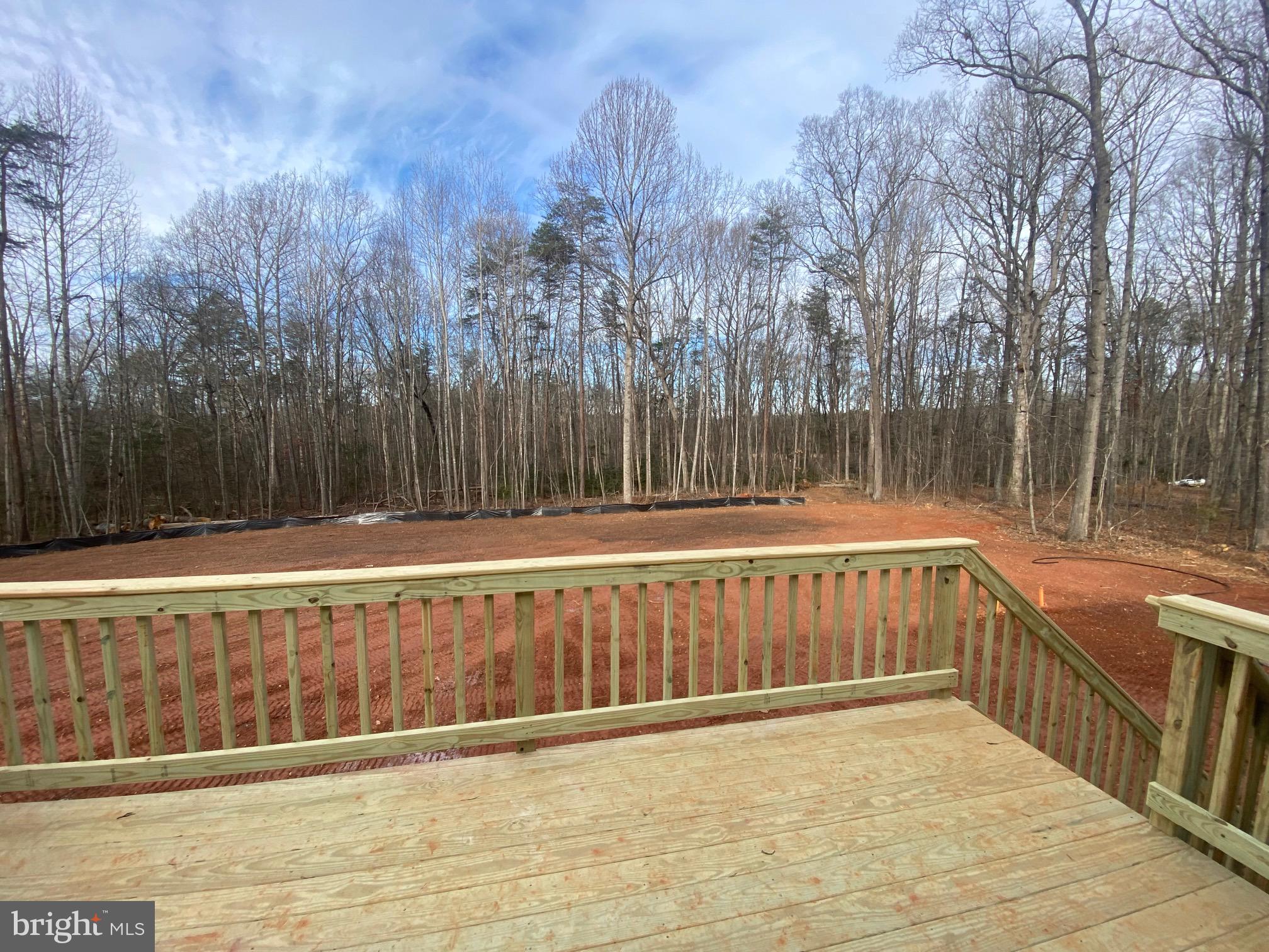 12260 Tower Road Unionville, VA 22567 - Photo 10 of 12 rear yard w/ 10x16 deck & stairs to grade