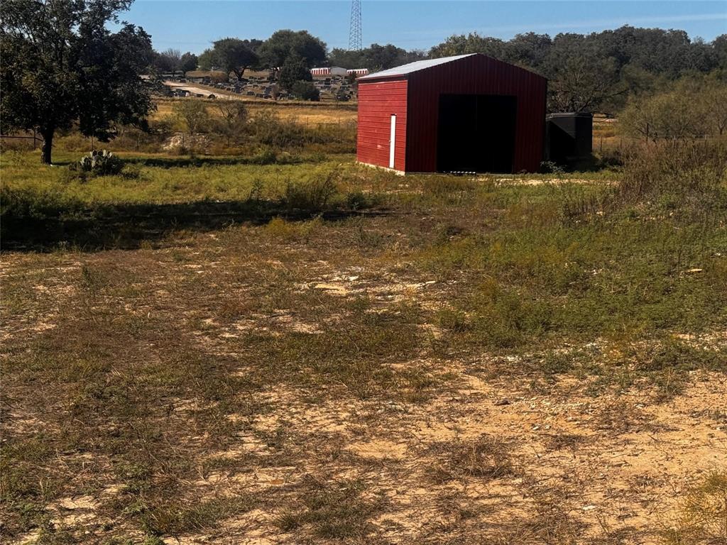a view of a large body of water with a building in the background