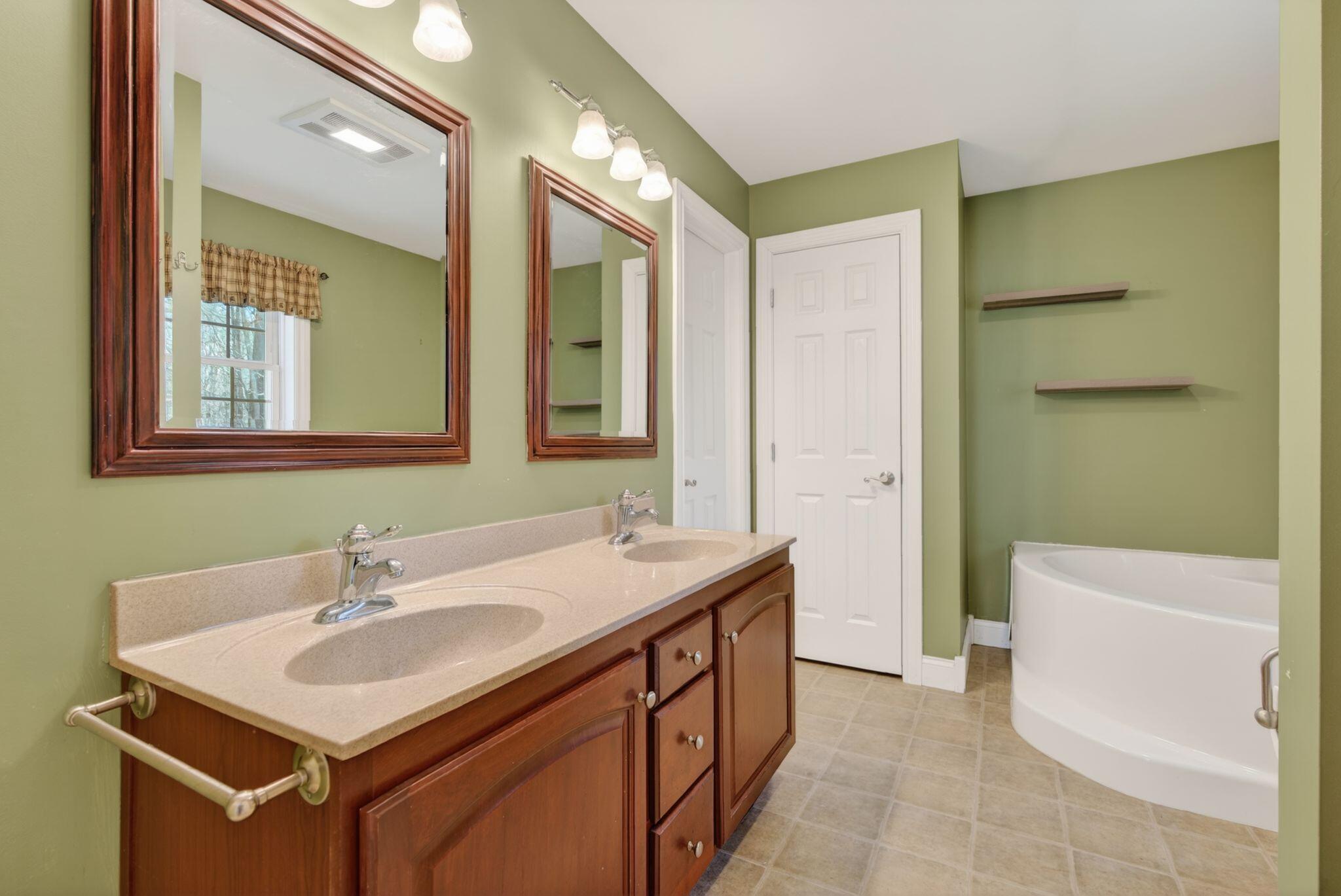 10 Wildberry Lane Saco, ME 04072 - Photo 54 of 95 Primary Bedroom Bathroom