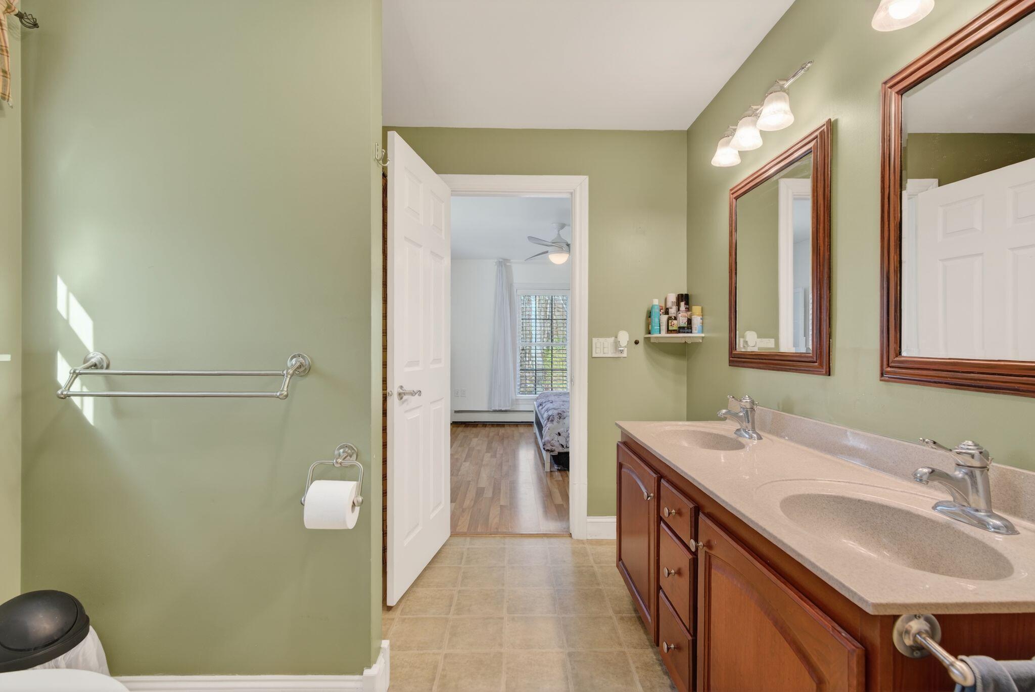 10 Wildberry Lane Saco, ME 04072 - Photo 56 of 95 Primary Bedroom Bathroom
