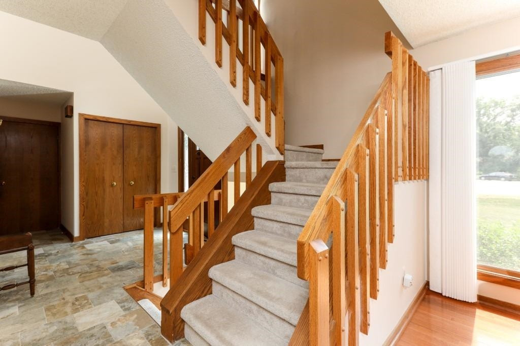 4082 Ramsgate Court Ann Arbor, MI 48103 - Photo 29 of 57 Open stairway leads to second level