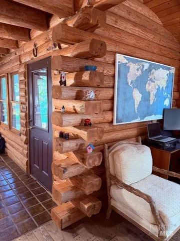 a room with furniture and wooden floor