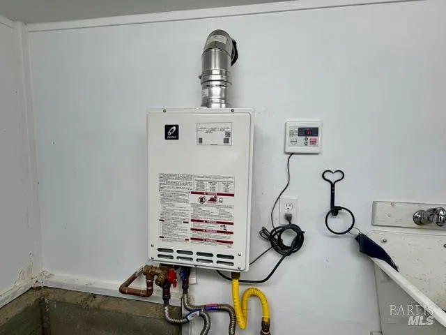 a view of a livingroom with furniture and a couch