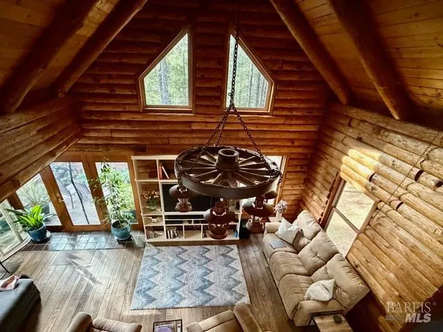 a view of a backyard with sitting area