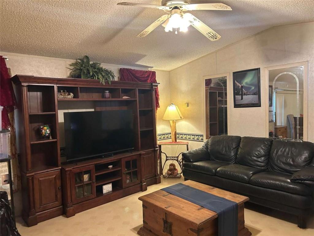 1544 Dry Creek Road Cedartown, GA 30125 - Photo 5 of 13 a living room with furniture and a flat screen tv