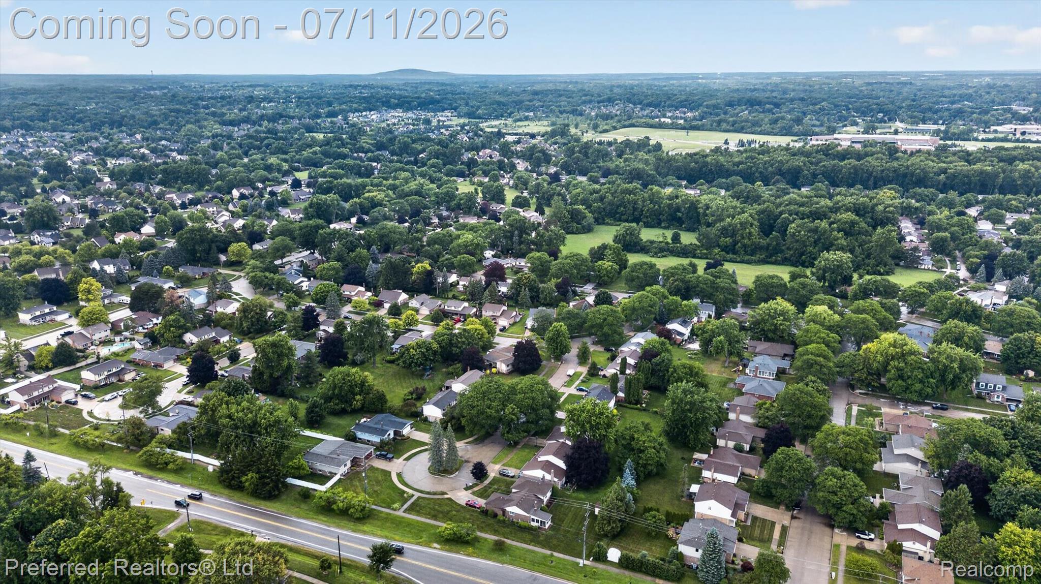 46596 Maidstone Road Canton, MI 48187 - Photo 59 of 61 Expansive aerial showcasing a residential area with mature tree coverage