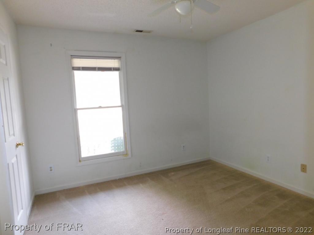541 Camden Road Raeford, NC 28376 - Photo 20 of 24 an empty room with a window