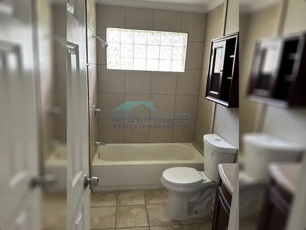 a view of cabinets and wooden floor