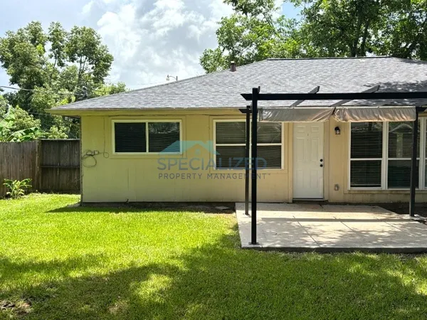 a view of backyard with green space