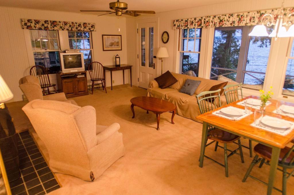 110 Snug Harbor Road Belgrade, ME 04917 - Photo 7 of 18 Living room with big views of Great...