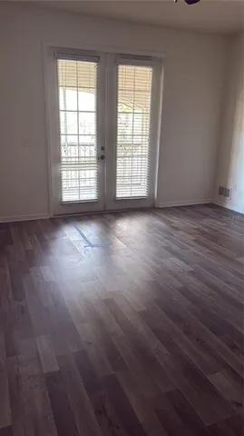 a kitchen with a cabinets washer and dryer