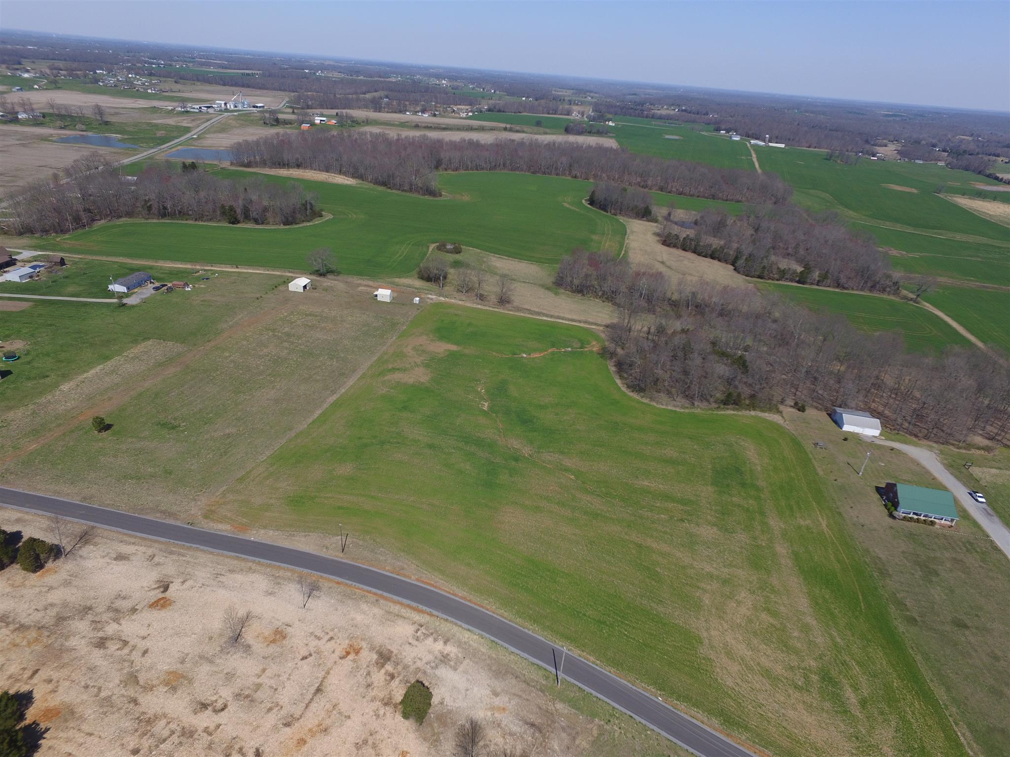 5 East Carter Road Portland, TN 37148 - Photo 8 of 11 a view of a lake with a big yard