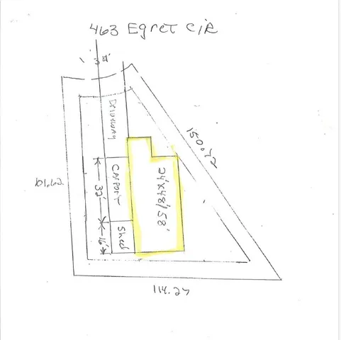 a view of a door with a sign of board