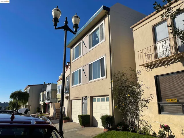a front view of a building with street view