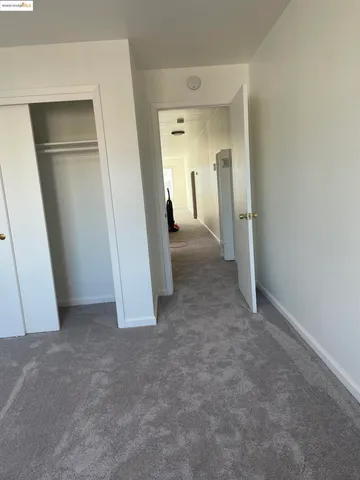 an empty room with closet