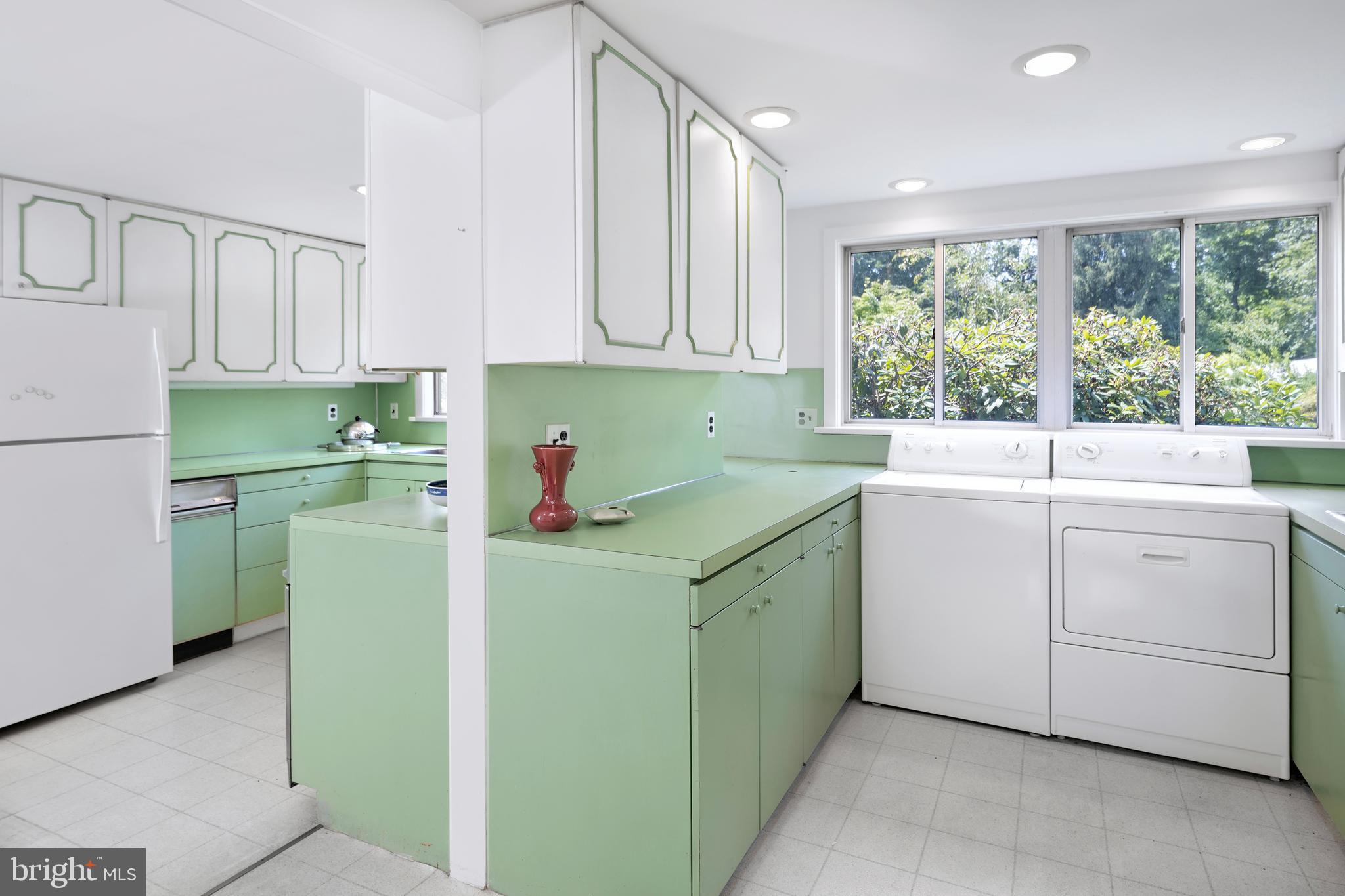 3486 Lawrenceville Road Princeton, NJ 08540 - Photo 15 of 34 The kitchen is mirrored by a laundry area.