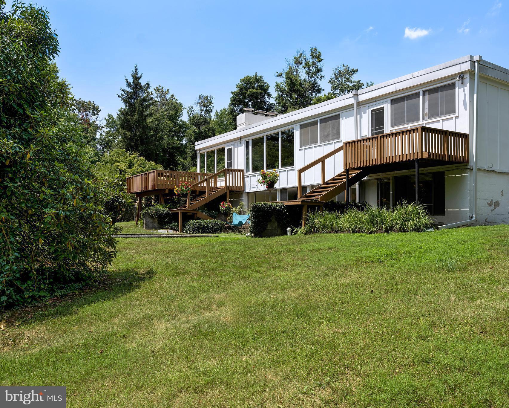 3486 Lawrenceville Road Princeton, NJ 08540 - Photo 4 of 34 The back of the house overlooks lawn and trees.