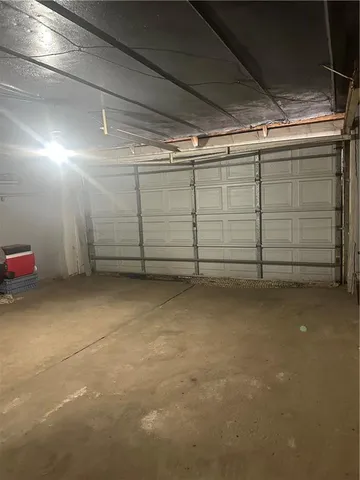 a view of a car parked in garage