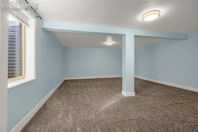 a view of an empty room with window