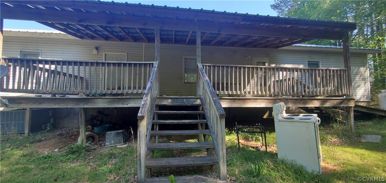 2564 Reedy Branch Road Brodnax, VA 23920 - Photo 4 of 6 a view of balcony with two chairs and a table