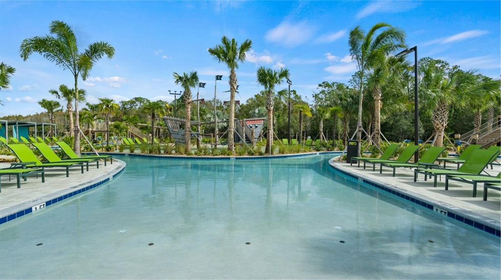 4839 Kings Castle Circle Kissimmee, FL 34746 - Photo 19 of 20 a view of a swimming pool with a patio